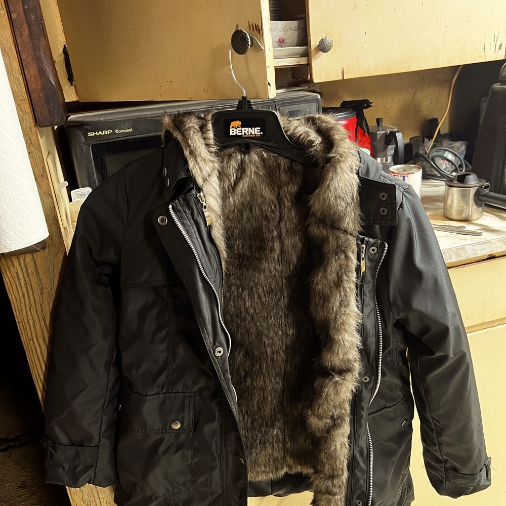 Parka jacket brand new never worn.I bought it too little. It is a small.